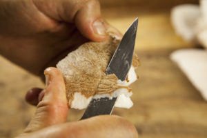 peeling coconut